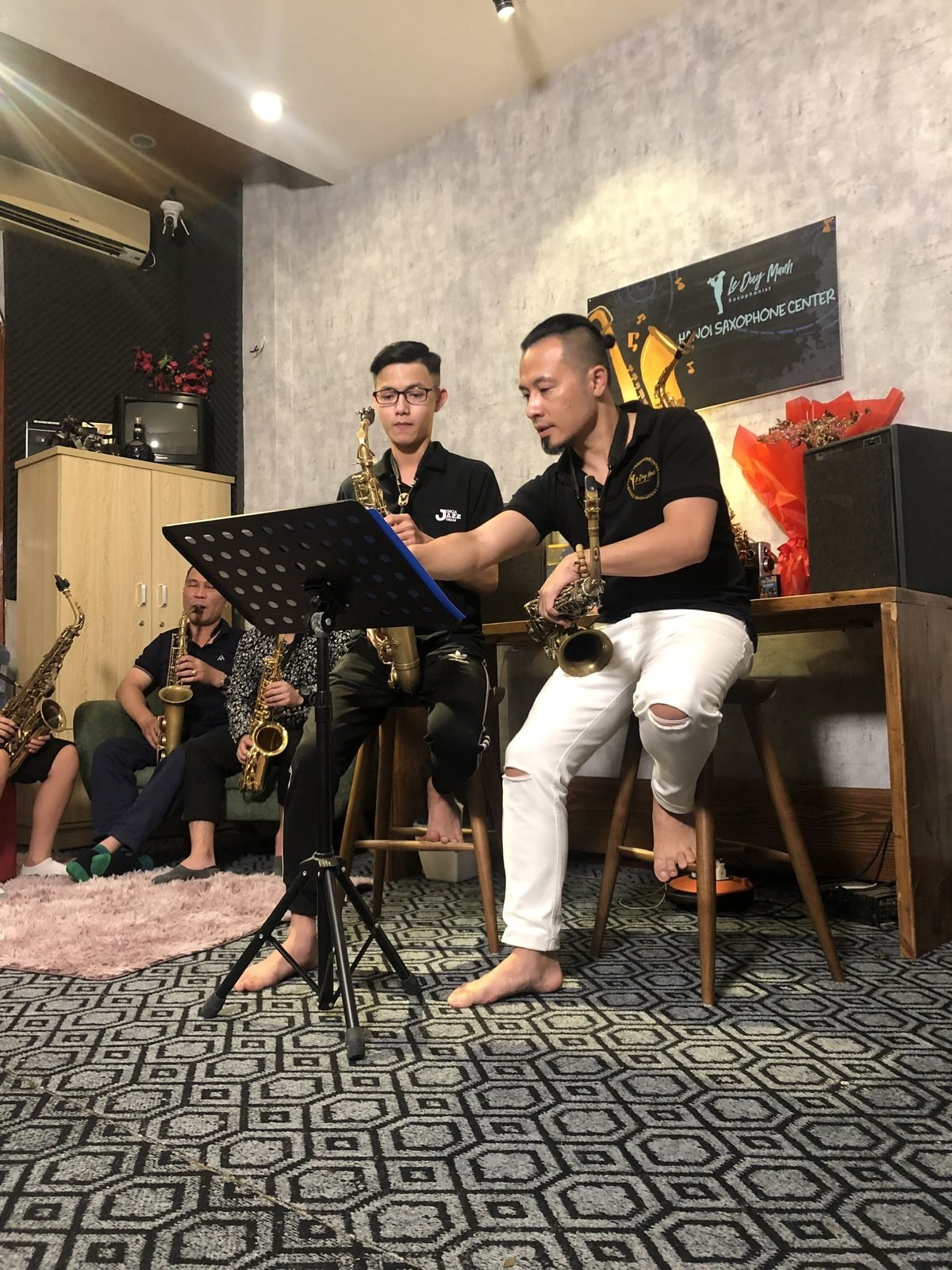 Practising saxophone alone to a plan — reading the score and breaking it down bar by bar
